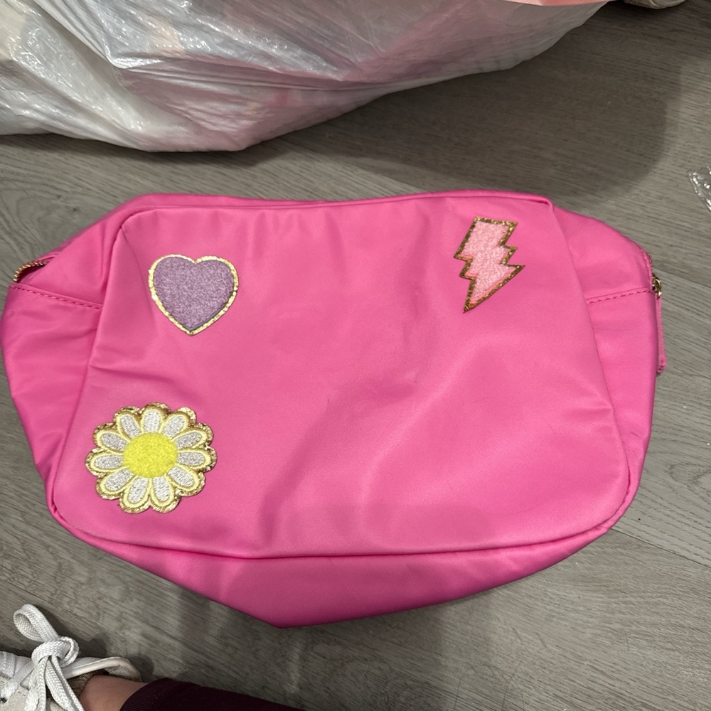 Large cosmetic bag with patches